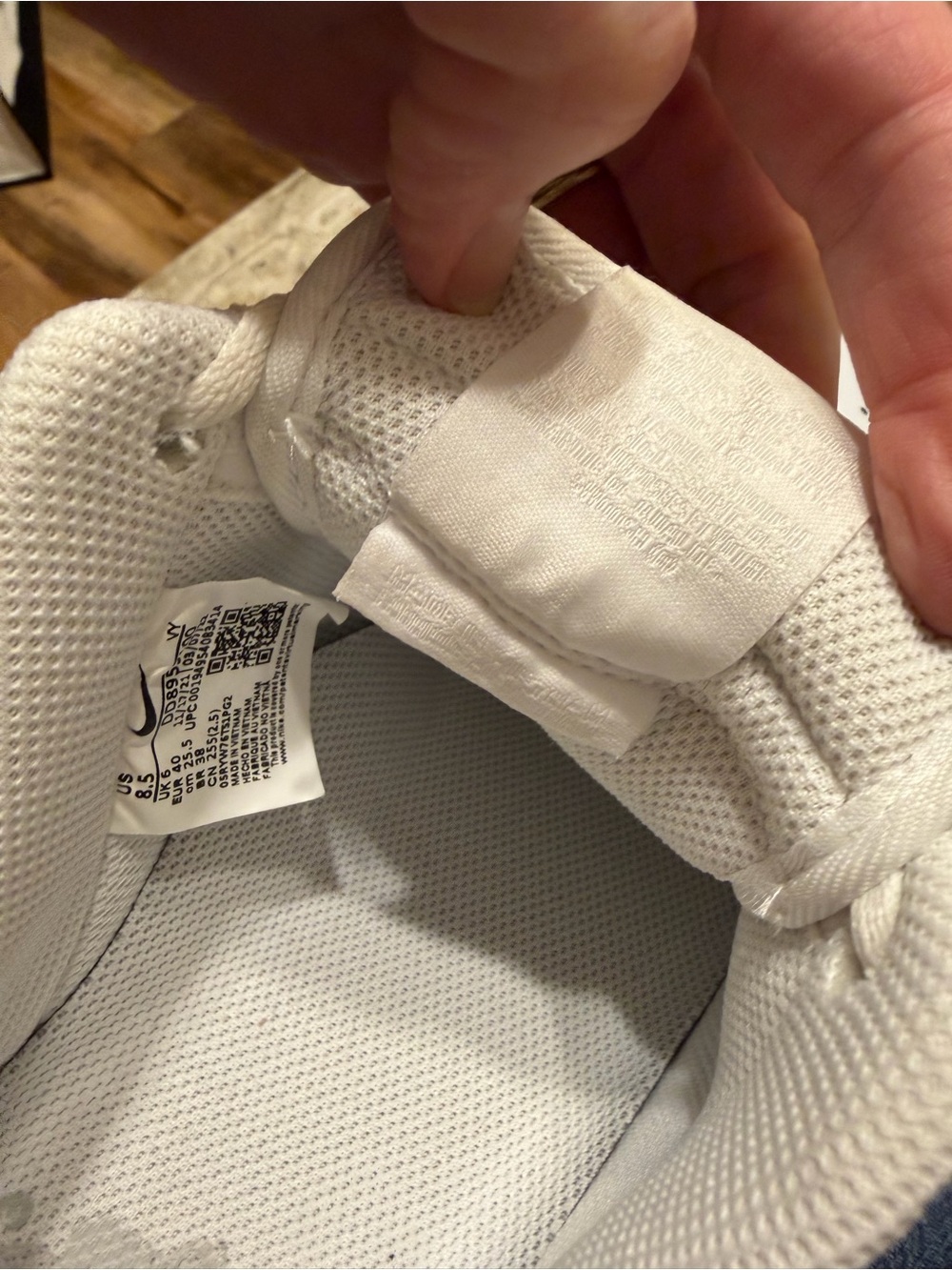 Nike All-White Low-Top Sneakers - Picture 9 of 10
